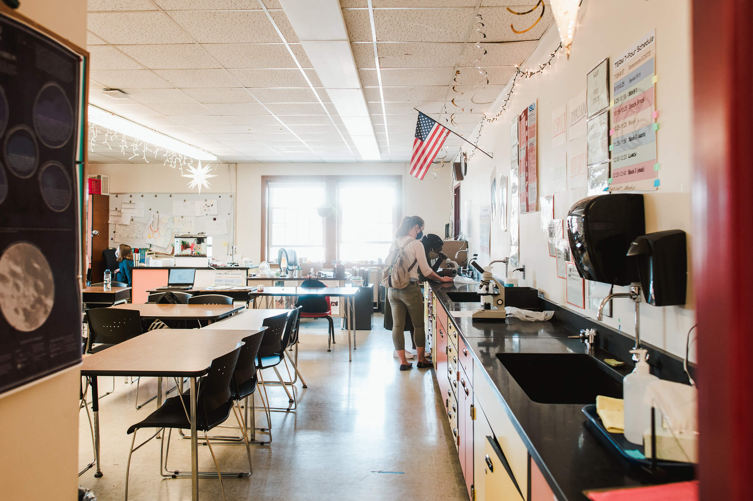 Education Programs 2 education student works with middle school student