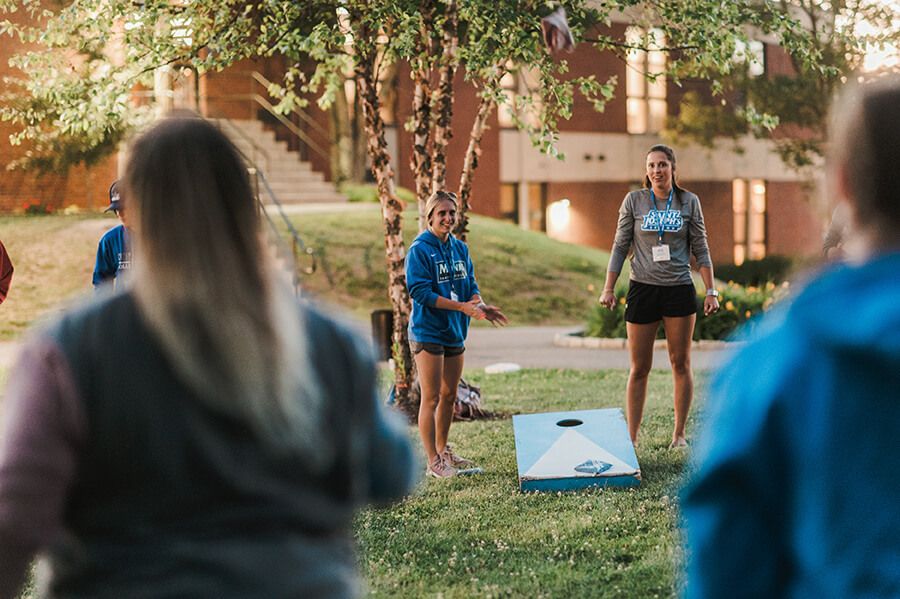 Jumpstart 1 students playing lawn games