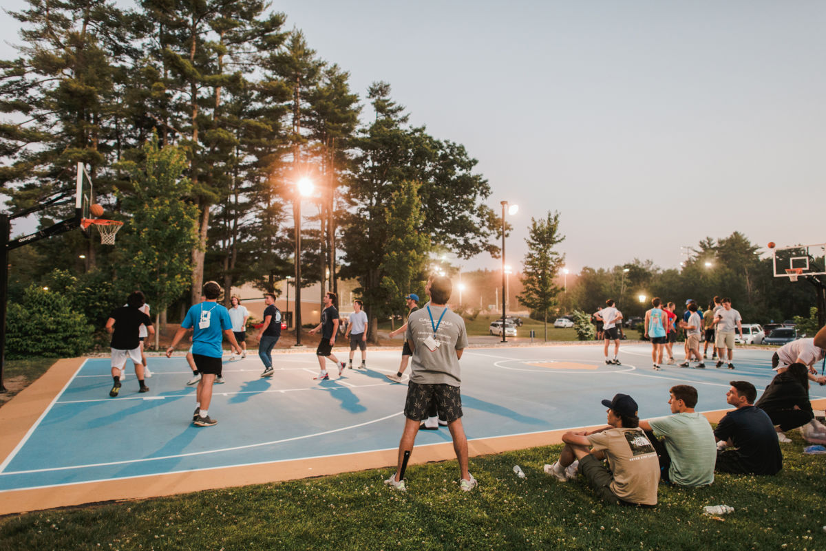 Campus Admissions 5 Students playing basketball on Clark's Court