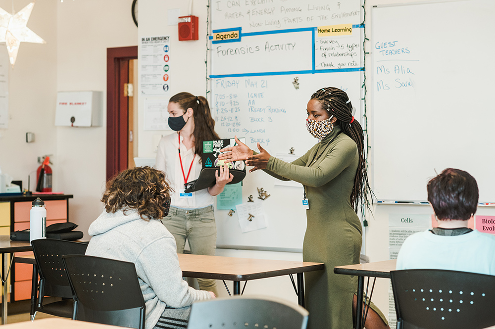 Students teaching in a local school