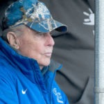 Dick Bailey focuses on the play in front of him from the dugout
