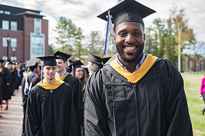 Admissions Office to Host Fall Events 4 graduates marching to Commencement ceremonies at Saint Joseph's College of Maine
