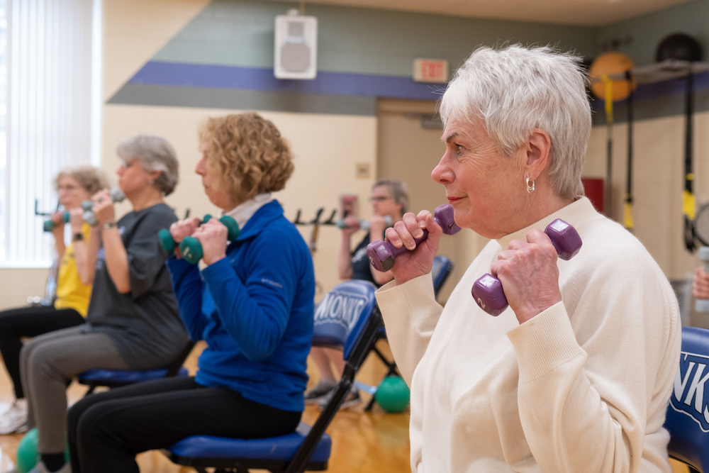 SilverSneakers participants exercise at Saint Joseph's College of Maine