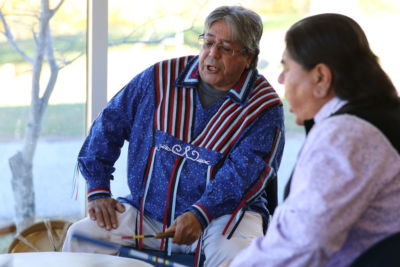 Wabanaki Drum Group Members Perform, Reminisce With Sisters, And Visit Freight Farm 6 Dean Francis and Ron Bear singing at the drum