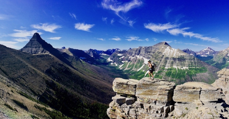 Trail Magic 1 Effie stands on a mountaintop with a beautiful vista