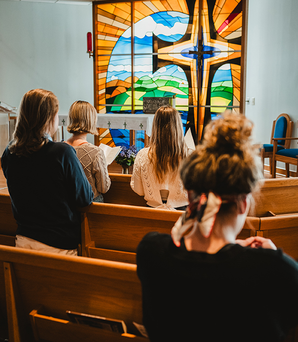 students in Healy Chapel