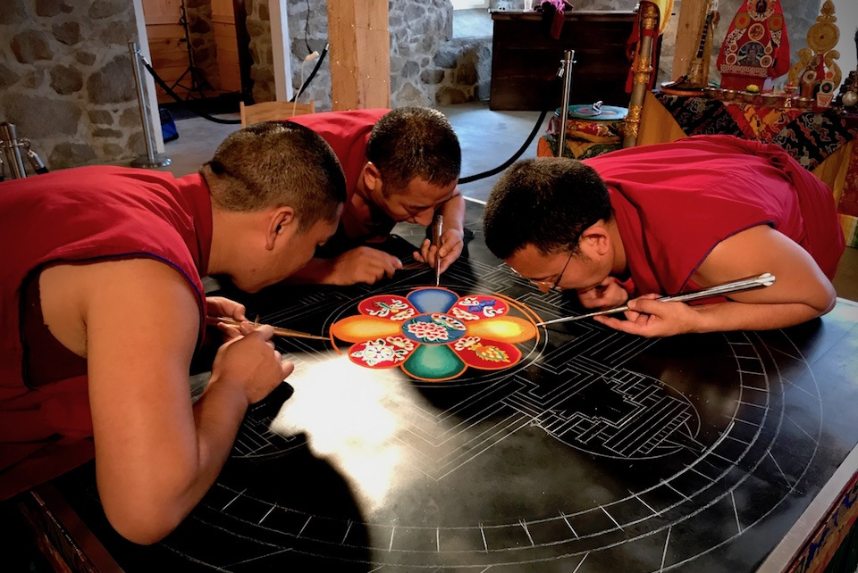 Healing The Earth 2 Tibetan Buddhist monks paint a colorful mandala.