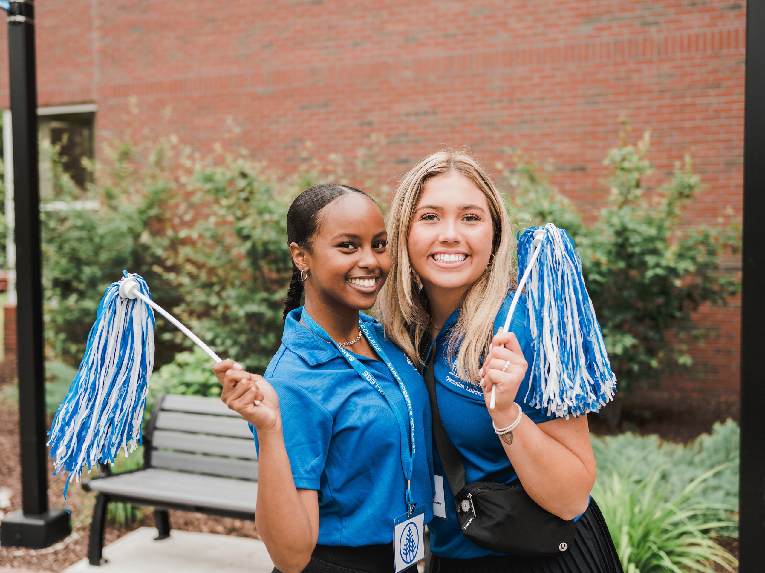 Student Life 5 Female students welcoming new students to campus