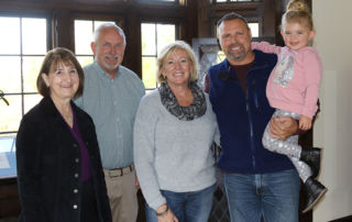 Liz Schran, Director of Corporate & Foundation Relations, President Jim Dlugos, Laurie Rairdon, Gary Rairdon, and Maya Rairdon