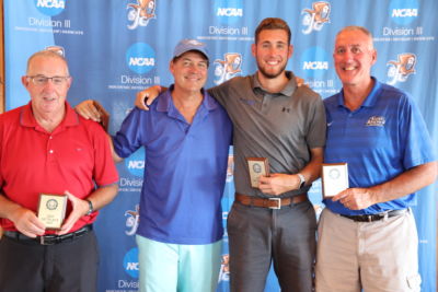 1st Place Net Ray Convery, Brad Pollard, Michael McDevitt, and Mike McDevitt ’83 pose with their plaques amongst one another