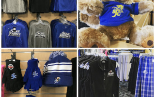 New Sjc Campus Store Located In Heffernan Center 1 Shelves at the SJC Campus Store's new location in the Heffernan Center display Saint Joseph's College merchandise, including shirts, a teddy bear, gloves, hats, and flannel pants. Saint Joseph's College of Maine