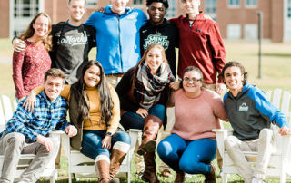 Maine Higher Ed Institutions Push For Dreamer Relief 1 campus students in the fall gather in front of Alfond Hall
