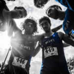 Success Stories From Students, Staff, And Alum Are Featured In New Online Magazine 6 cross country team huddle