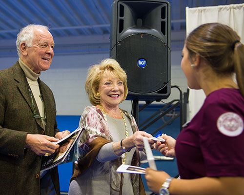 Jeanne And Ed Arnold With A Nursing Student Jeanne and Ed Arnold with a nursing student