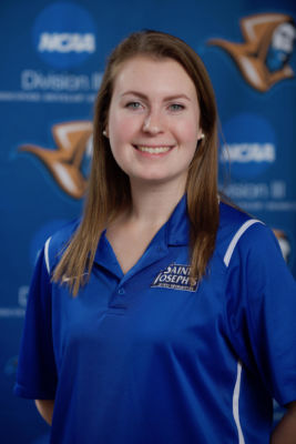 Monks News 1 Newly hired Assistant Sports Information Director, Megan Dunlap, poses happily