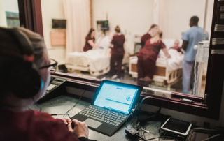 Nursing students practice their skills in the nursing simulation lab