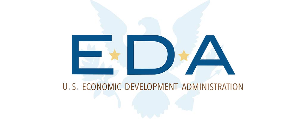 us-economic-development-administration Logo of the U.S. Economic Development Administration (EDA) featuring blue letters "EDA" with gold stars and a white eagle silhouette in the background. Text below reads "U.S. Economic Development Administration - In Partnership with the Institute for Local Food Systems Innovation. Saint Joseph's College of Maine